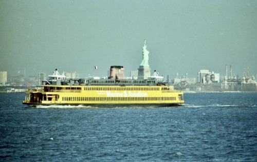 Staten Island Ferry Passing the Statue of Liberty and Ellis Island, New York Harbor, 1973.