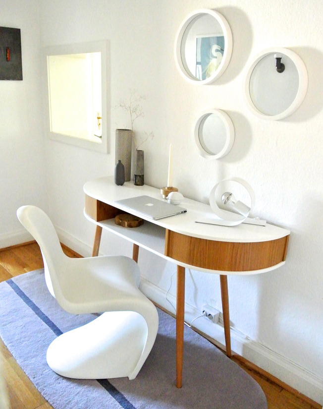 Reader Ute Latzke submitted her workspace.
“ This is my second workspace, cause I like sitting in different rooms :-), scandinavian design: console table, carpet and the other stuff.
”