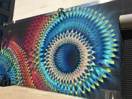 hifructosemag:  Miami’s Douglas Hoekzema, also known as Hoxxoh, creates murals that do more than absorb the gaze of the viewer. Nearby objects appear as though they can be pulled into the artist’s latest, hyperdimensional works. More on HiFructose.com.