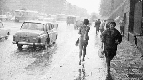 Zbyszko Siemaszko. Rainstorm on Puławska Street (Levitating girl). Warsaw, Poland. 1968