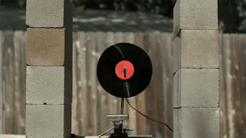 thestonecuttersguild:laughingsquid:Spinning a Vinyl Record So Fast That It ShattersThat was record b