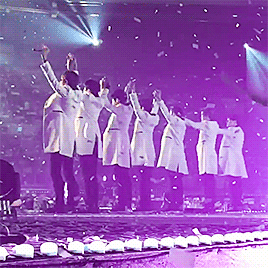 Myungsoo pats Sungjong’s hair for attention, and Jongie stretches his hand out to Myungie with