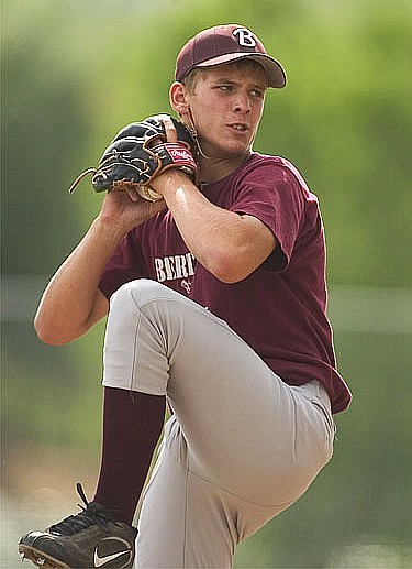 Baseball player throwing a pitch