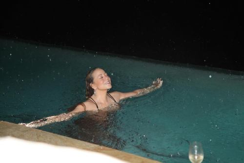 tibets: mariah carey in a pool while it’s raining. she is experiencing many emotions, primaril