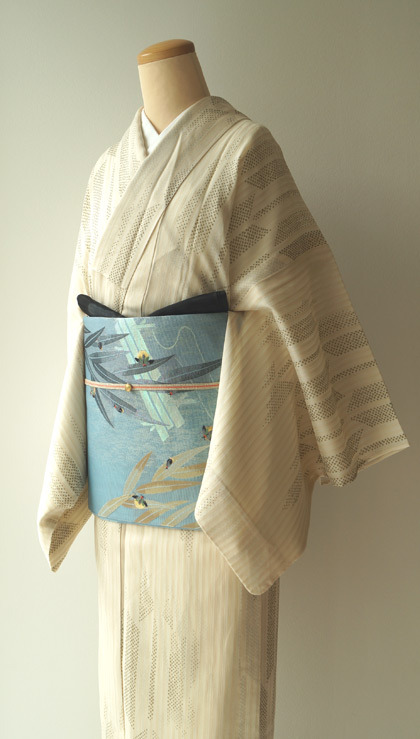 Breathtaking summer obi, depicting fireflies frolicking among bamboo leaves over the water (seen on)