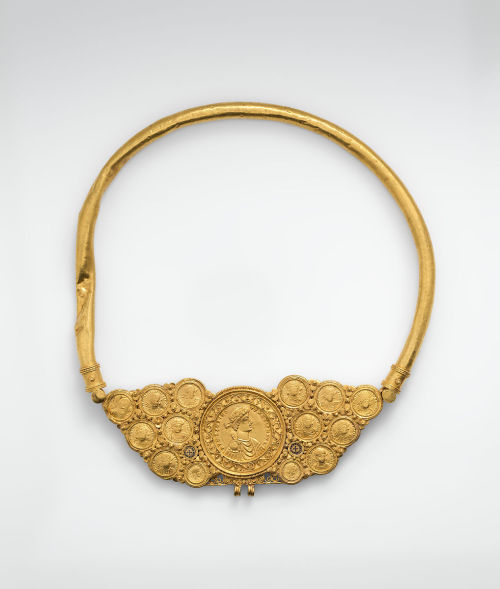 A pectoral made of coins and a medallion featuring Byzantine emperors, ca. 540. The hooks at the bot