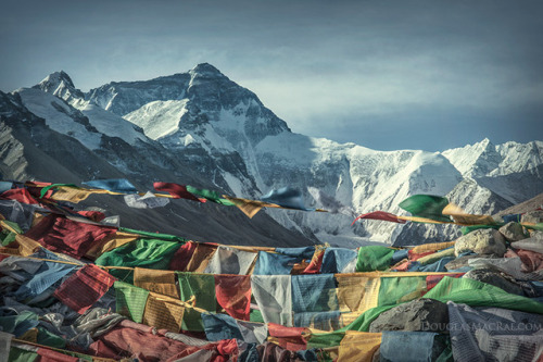 8AM at Mount Everest in Tibet, the view from the prayer flag topped mound that overlooks climbers ba