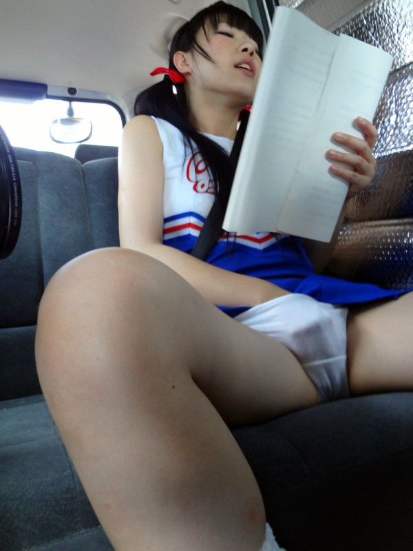 gookdom:  She was reading a note that was passed to her in class.  It was not a