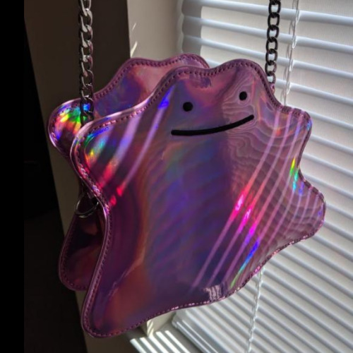 retrogamingblog:Holographic Ditto Purse released by LoungeFly