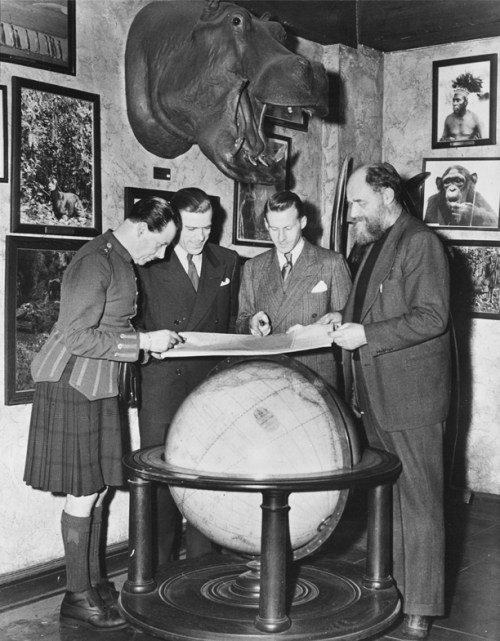 Plans being discussed before the start of the Kon-Tiki Expedition at the Explorers Club in New York 