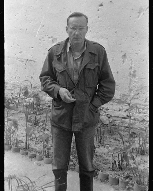 William Burroughs by his Villa Mouneria Garden wall, Tangier, Morocco, Spring 1957. Bill had been ty