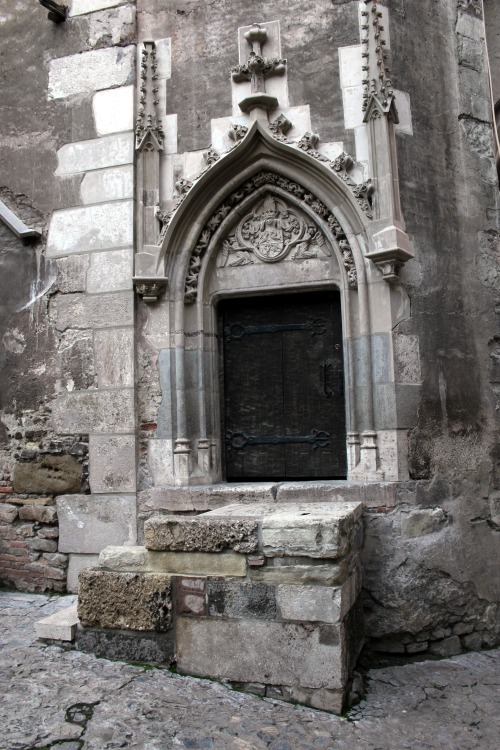 medievalvisions:  Door at Hunyad Castle, Hunedoara, Romania by TeamBCX.