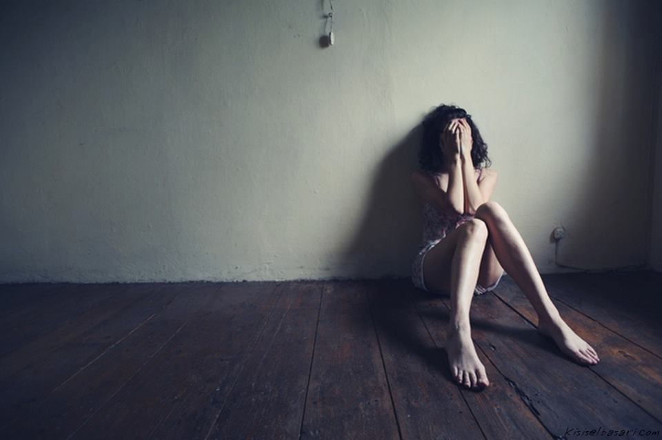 Girl sitting on floor