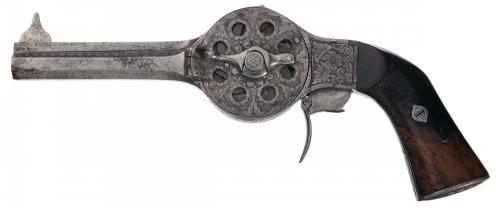 Rare engraved ten shot Noel turret revolver, originates from France, mid 19th century.Sold at Auctio