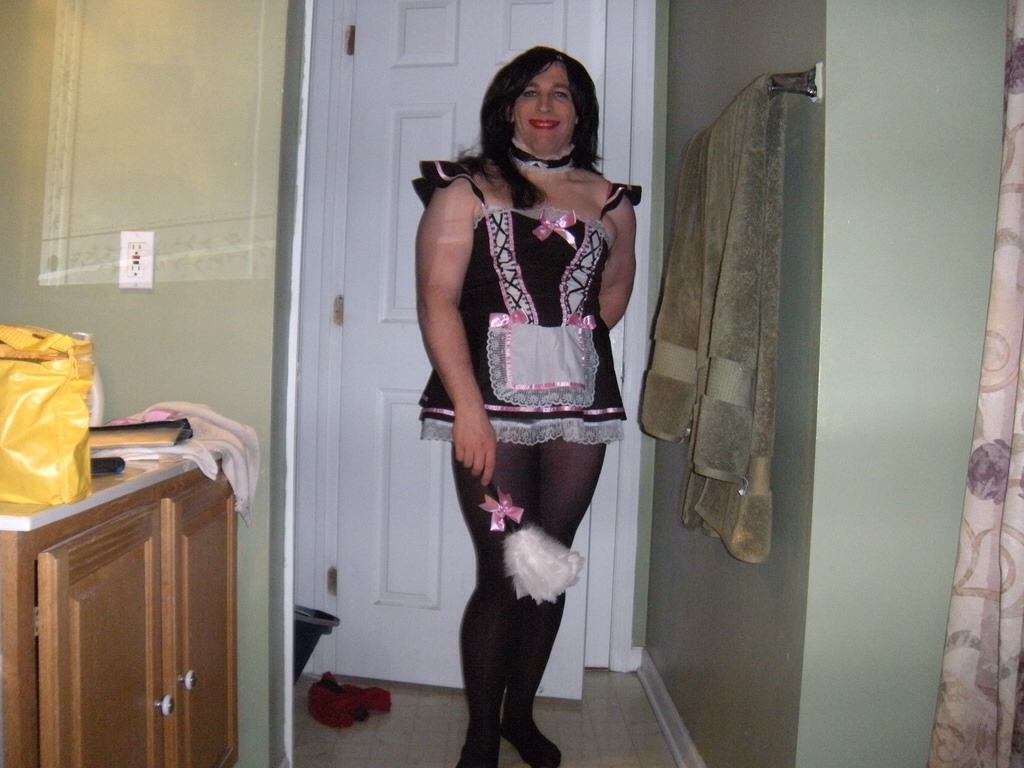 I love how HAPPY this sissy looks in her French Maid uniform. I also hope she did