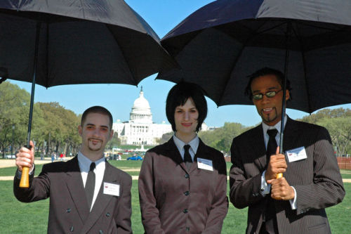 Members of the “Boston Direct Action Project” dressed as vampires impersonate public relations assoc