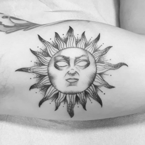 A #sun for his #son #desaturated due to redness #blackwork #stippled #tattoo by #femaletattooartist 