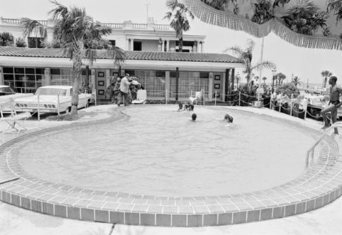 lostinurbanism:Motel Manager, James “Jimmy” Brock Pouring Acid Into Pool to Drive B