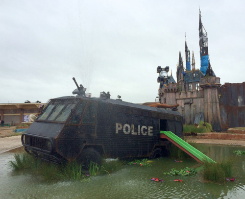 zombies-with-radios:  Dismaland Bemusement Park   Built secretly by street-artist Bansky over the Tropicana swimming pool in the English resort town of Weston-super-Mare