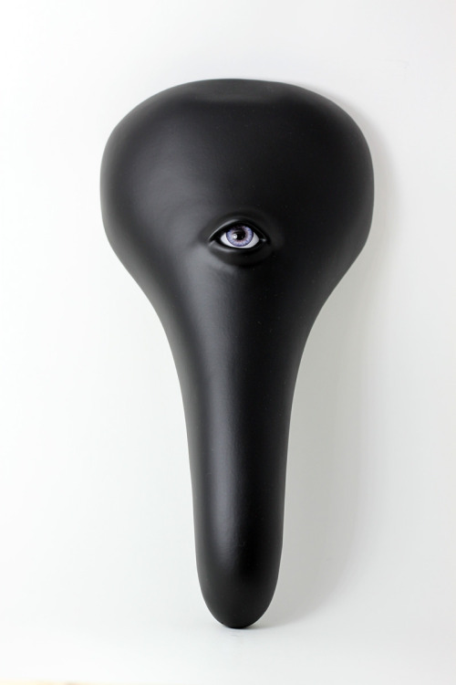 clemchen:  Pink Eye - Modified bike seat.  Acrylic, spray paint and epoxy.  Hot Art Wet City