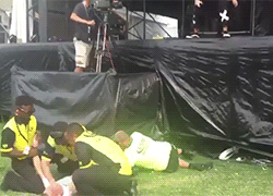 blnik182:jenna mcdougall protecting a fan from security at brisbane soundwave x