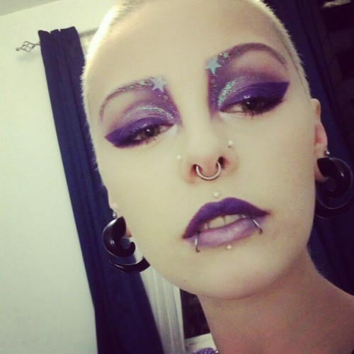 laura-aurora:  untitledunidentifiedunfinished:  Look from saturday night. Goth mermaid? #makeupjunkie #me #fotd #motd #glitter #purple  Star eyebrows.  Doing it right. 
