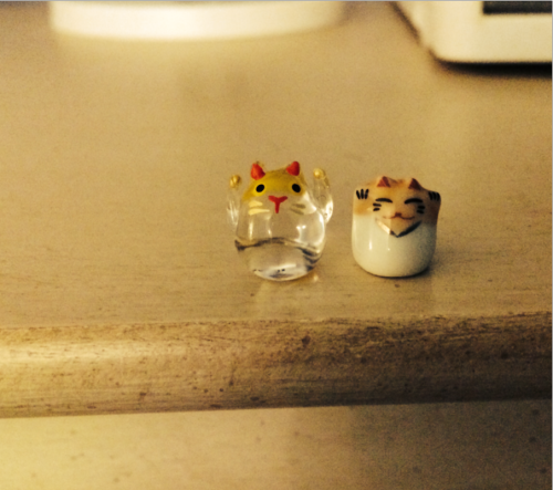 stuff from comic con- i got these tiny cats because they reminded me of eddie. also an asuka capsule