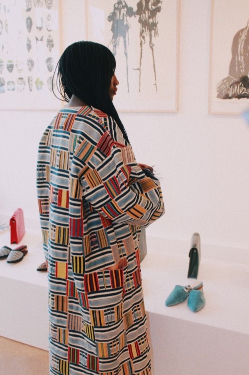 velma rossa at the moonlookworld gallery in a beautiful imane ayissi coat .paris.