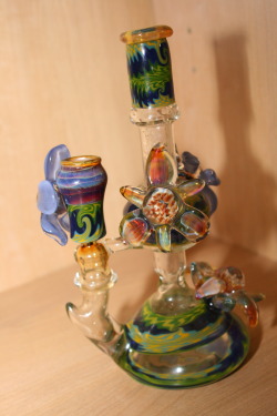 redwoodmagpie:  DaniGirl piece Adam bought me yesterday after we sold off our old custom Matt Casio earlier in the day.  Look at that line work, look at those pretty marbles turned flowers.  Came with a silly dish and a bit too thick of a dabber, but