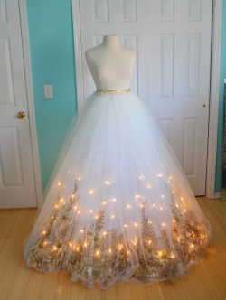 doxiequeen1:  Well, the skirt is done! It came out better than I had expected, it looks almost exactly like I had envisioned so i’m really happy.  It’s made from thirty yards of tulle, five yards of organza, fifteen meters of LED lights, eighteen