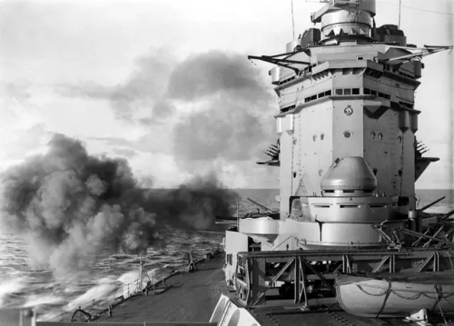 British Battleship HMS Rodney Fires Her Secondary Battery During Exercises, December 1940