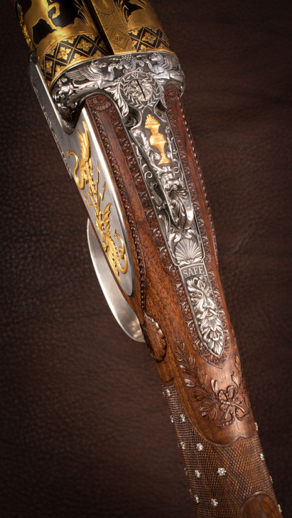 gunrunnerhell:Westley Richards “Boutet Gun”Ornately engraved 12 gauge pinless sidelock shotgun. You 