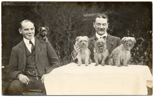 beggars-opera:Victorians/Edwardians playing with their dogs!