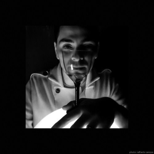 Mocking around.Birthday dinner with friends, light globe, red p&amp;s camera, infrared wine (or 