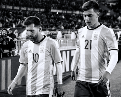 barcelonaesmuchomas:Lionel Messi retires from the field with Paulo Dybala during the 2018 FIFA Argen