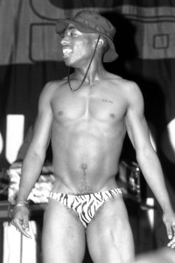 ohyeahpop:Tupac Shakur performs onstage with