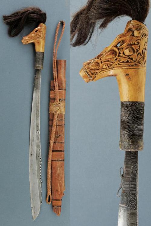 Dayak mandau with carved bone hilt, Borneo, early 20th century.from Czerny’s International Auc