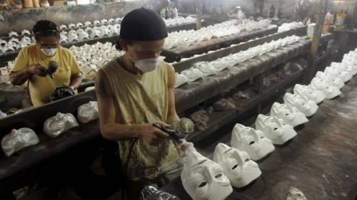 fuckyesbitches:  ignoring-spiders:  theyoungradical:  mass producing your fake revolution  the fucking irony  I saw protesters in boston today about anarchy all wearing the Guy Fawkes mask whoops