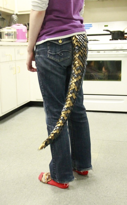 Here's The Most Recent Tail Commission I Completed. Brown (anodized Aluminum) Background With Black (anodized