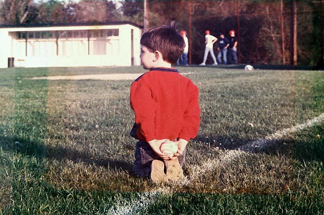 siphotos:  A young Matt Harvey appears to be waiting for his chance to pitch.  The