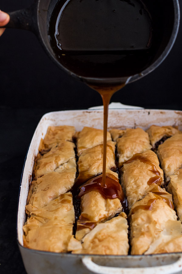 sweetoothgirl:  Chocolate “Candy Bar” Baklava with Butter Rum Sauce 