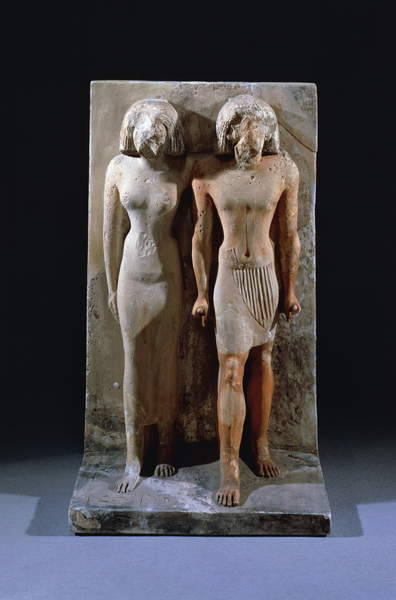 Pair statue of Hetep-seshat and his wifeThe faces of these standing figures of a man and his wife ha