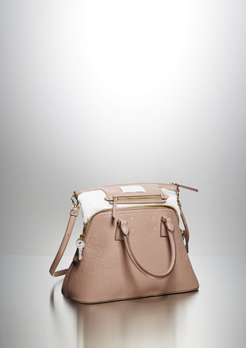 An exposed lining transforms a traditional shape; the #Margiela5AC emerges as a one-of-a-kind piece.