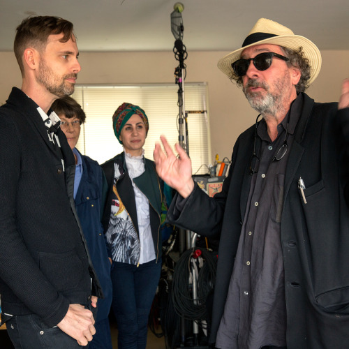 Director Tim Burton shares a moment with author Ransom Riggs on the set of Miss Peregrine’s Home for