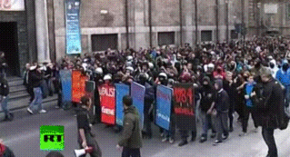 kropotkindersurprise:  transkafka:  combine praxis and theory by beating a cop with a book  These Italian students are way ahead of you[video]