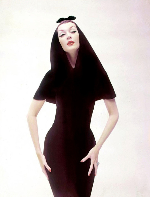 wehadfacesthen:Dovima wearing a hooded dinner dress by Balenciaga in a photo by Richard Avedon, Pari