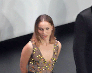 tallythor:  a-tongue-is-like-a-sharp-knife:   As Chris couldn’t make it tonight, he prepared you, Natalie, a little surprise.  “Thor : The Dark World” premiere in Paris on Oct 23rd 2013 (taken by me)  Which begs the question, who is that