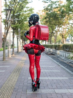 sutiblr:  Black and Red Rubber Clothing with Red Randoseru in Public