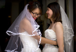 beautiful-brides-weddings:  Rather than waiting for the Chinese government to recognize their right to marry, Teresa Xu and Li Tingting held an informal ceremony in Beijing in June 2015. 