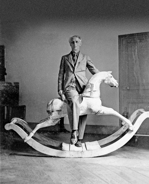 loverofbeauty:    Max Ernst on Rocking Horse,   Paris   (1938) 